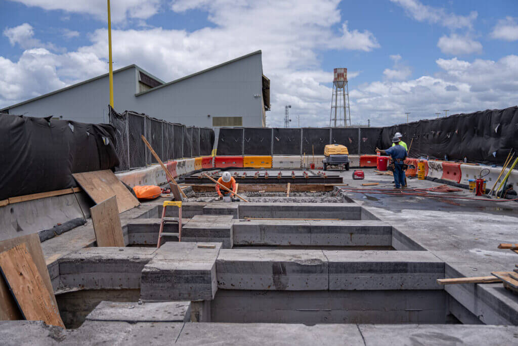 Spall and delamination repairs improving durability of Hilo Pier 1 support structures